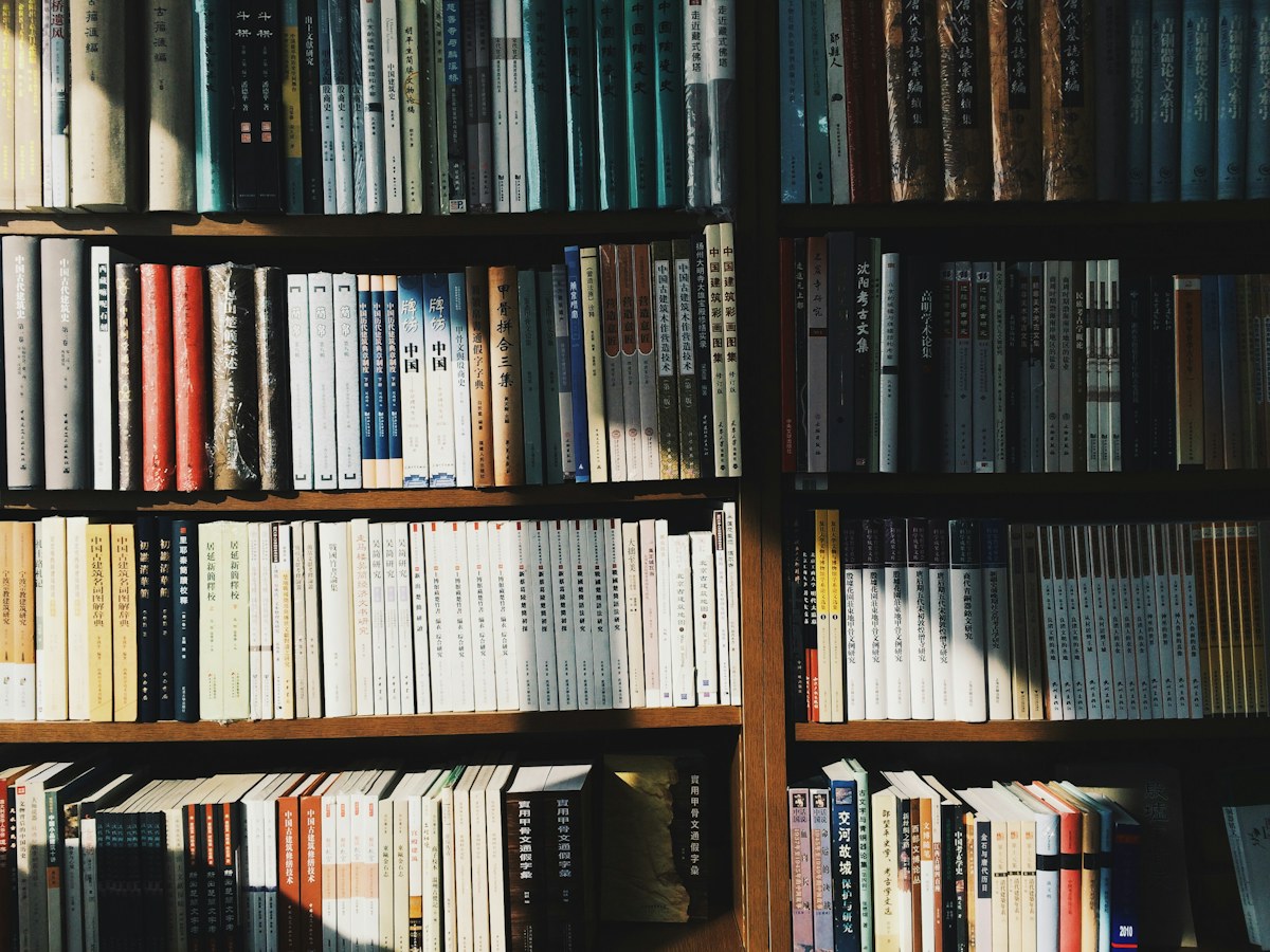 Rows of books on library shelves